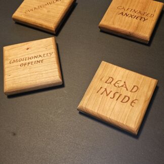 Overstimulated cherry wood coaster set with laser-engraved dark humor — Gentle Grain Workshop