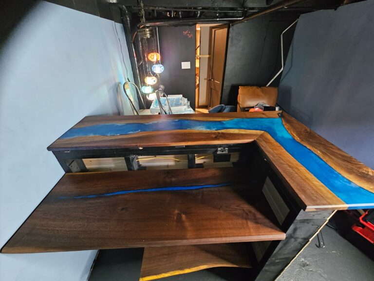 Custom Live-Edge Epoxy Bar 3 Custom live-edge walnut bar with a raised serving shelf and thin blue epoxy inlay